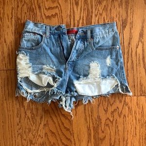 Distressed gently used high waisted jean shorts